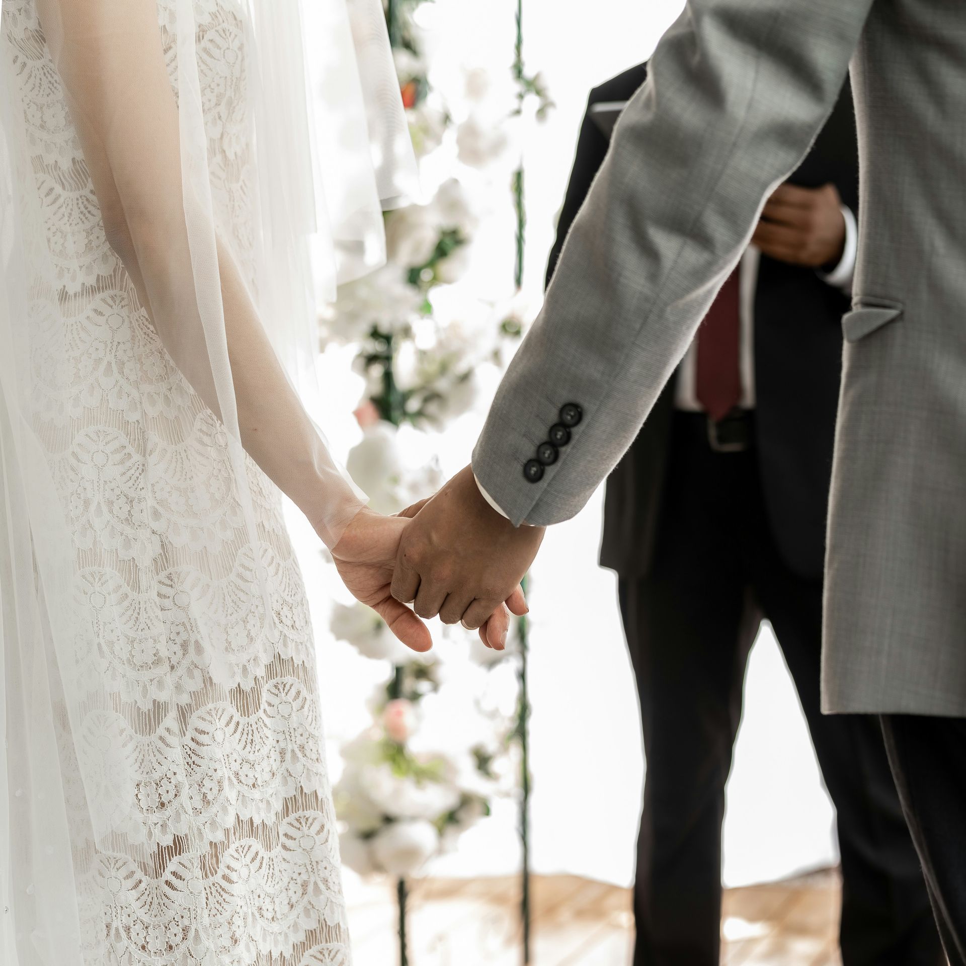 a close up of a person holding the hand of a person